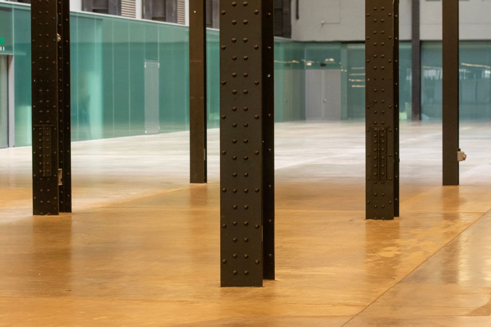 Polished stained-concrete floor in a bright interior space